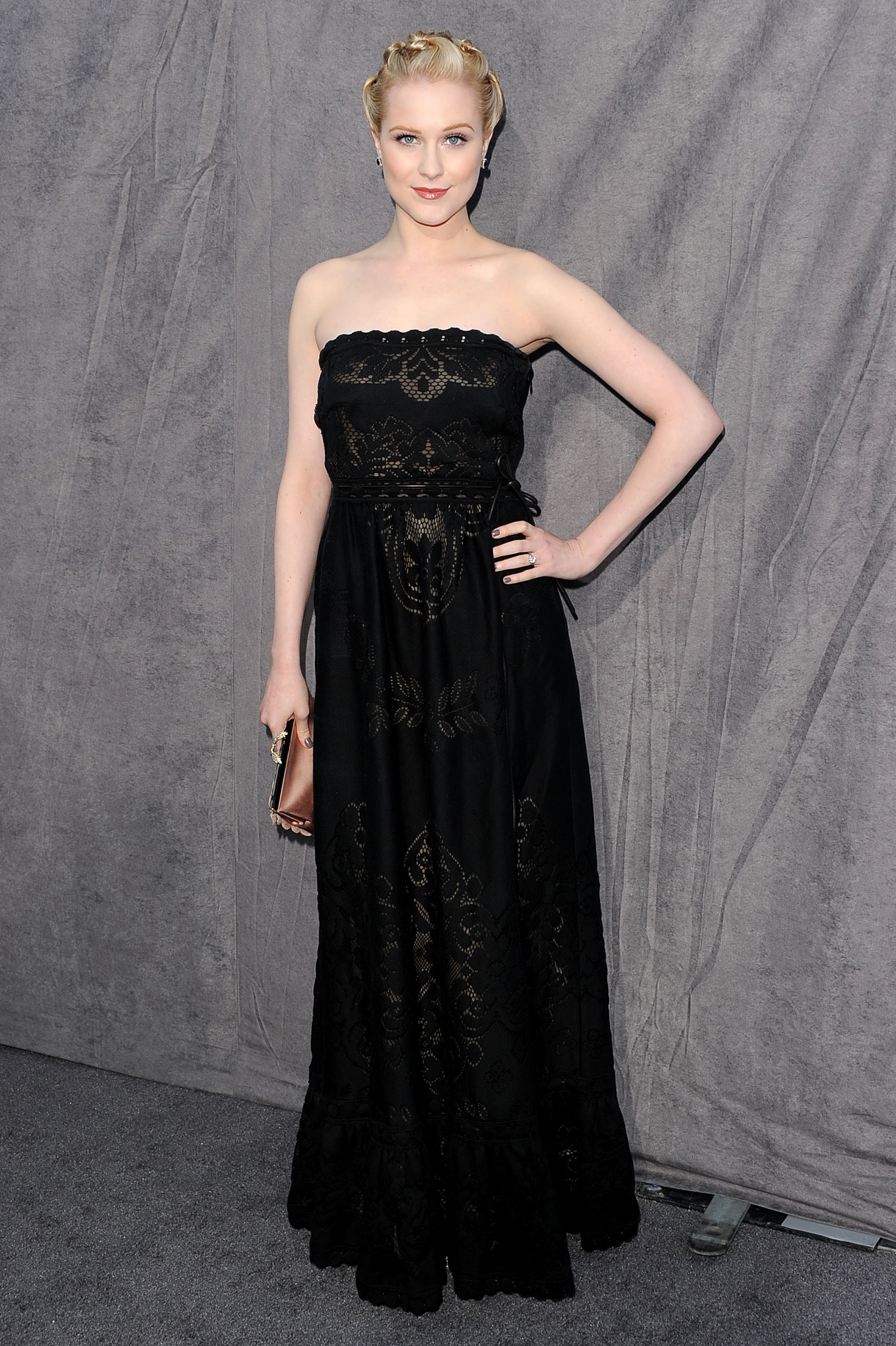 Evan Rachel Wood hit the grey carpet in a strapless black dress at the 2012 Critics' Choice Movie Awards. Evan Rachel Wood hit the grey carpet in a strapless black dress at the 2012 Critics' Choice Movie Awards.