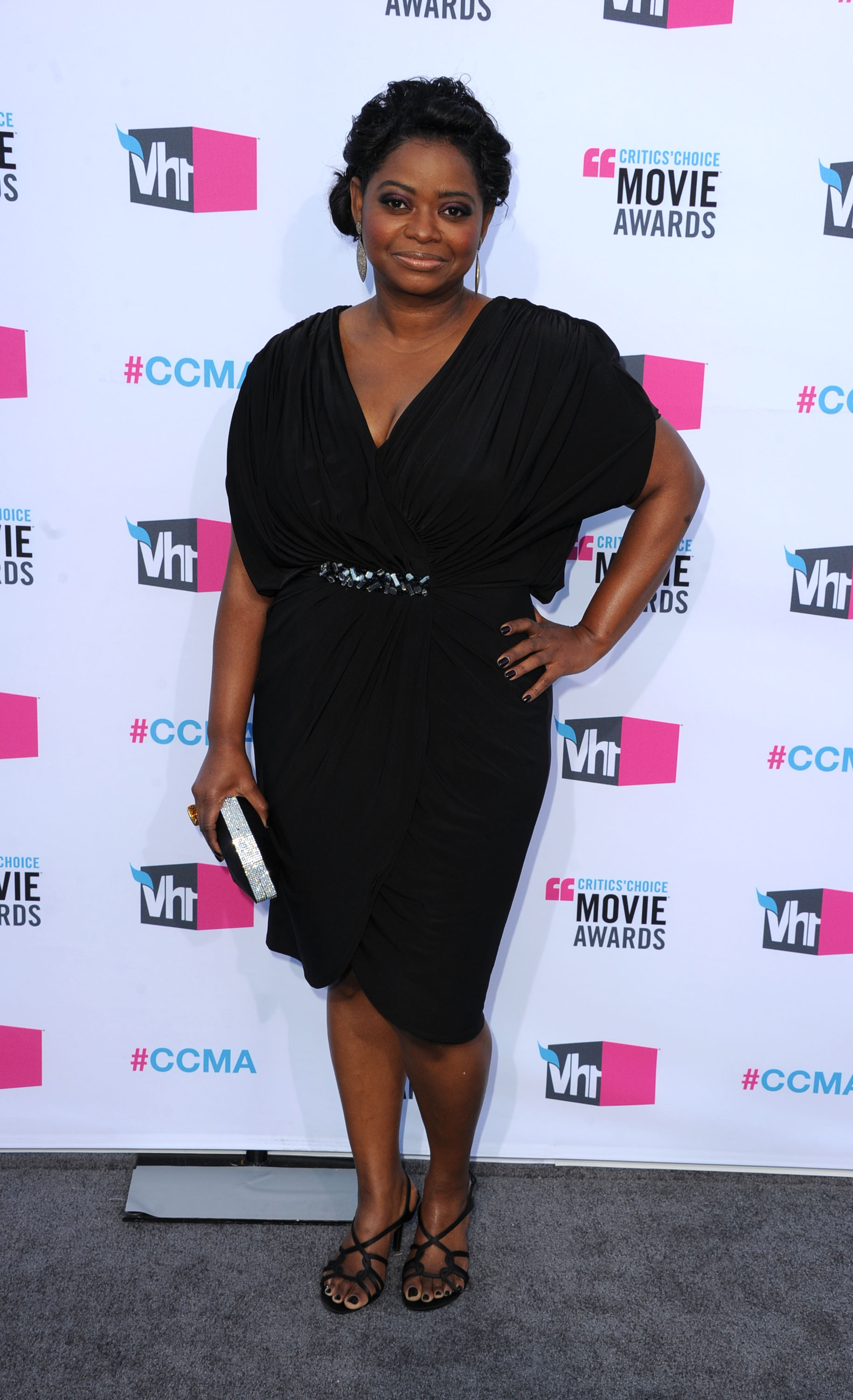 Octavia Spencer smiled on the grey carpet at the 2012 Critics' Choice Movie Awards. Octavia Spencer smiled on the grey carpet at the 2012 Critics' Choice Movie Awards.