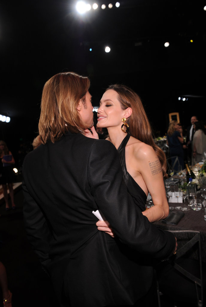 Brad Pitt and Angelina Jolie couldn't keep their hands off each other during the January 2012 SAG Awards.
Brad Pitt and Angelina Jolie couldn't keep their hands off each other during the January 2012 SAG Awards.