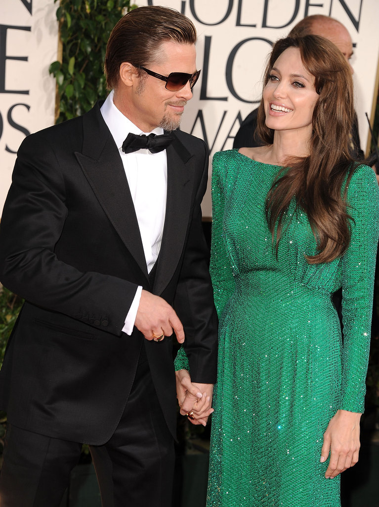 Fans went wild when Brad Pitt and Angelina Jolie stepped onto the red carpet at the January 2011 Golden Globes.
Fans went wild when Brad Pitt and Angelina Jolie stepped onto the red carpet at the January 2011 Golden Globes.