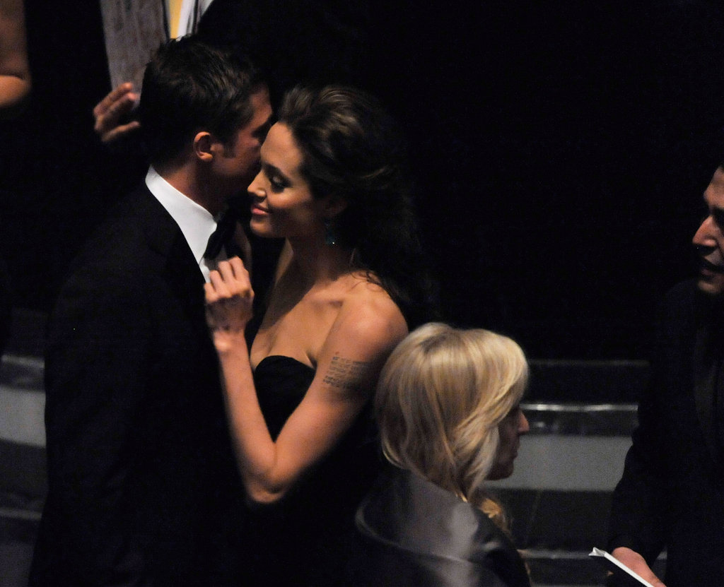 Angelina Jolie and Brad Pitt stuck close inside the February 2009 Academy Awards.
Angelina Jolie and Brad Pitt stuck close inside the February 2009 Academy Awards.