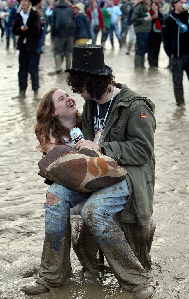 Glastonbury festivalgoers goofed off in the mud.
Glastonbury festivalgoers goofed off in the mud.