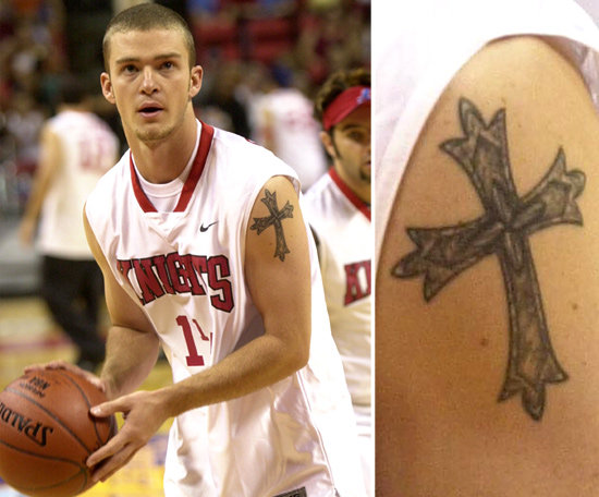 Justin Timberlake has a large cross tattoo on his upper left shoulder.
Justin Timberlake has a large cross tattoo on his upper left shoulder.
