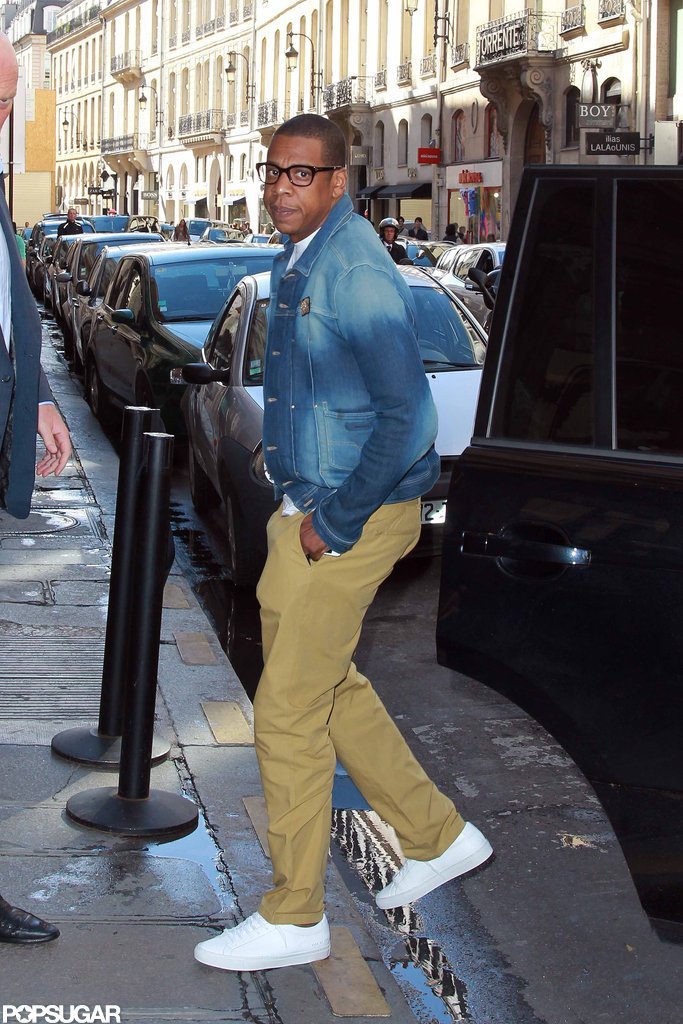 JayZ kept it casual in a jean jacket and tennis shoes. JayZ and