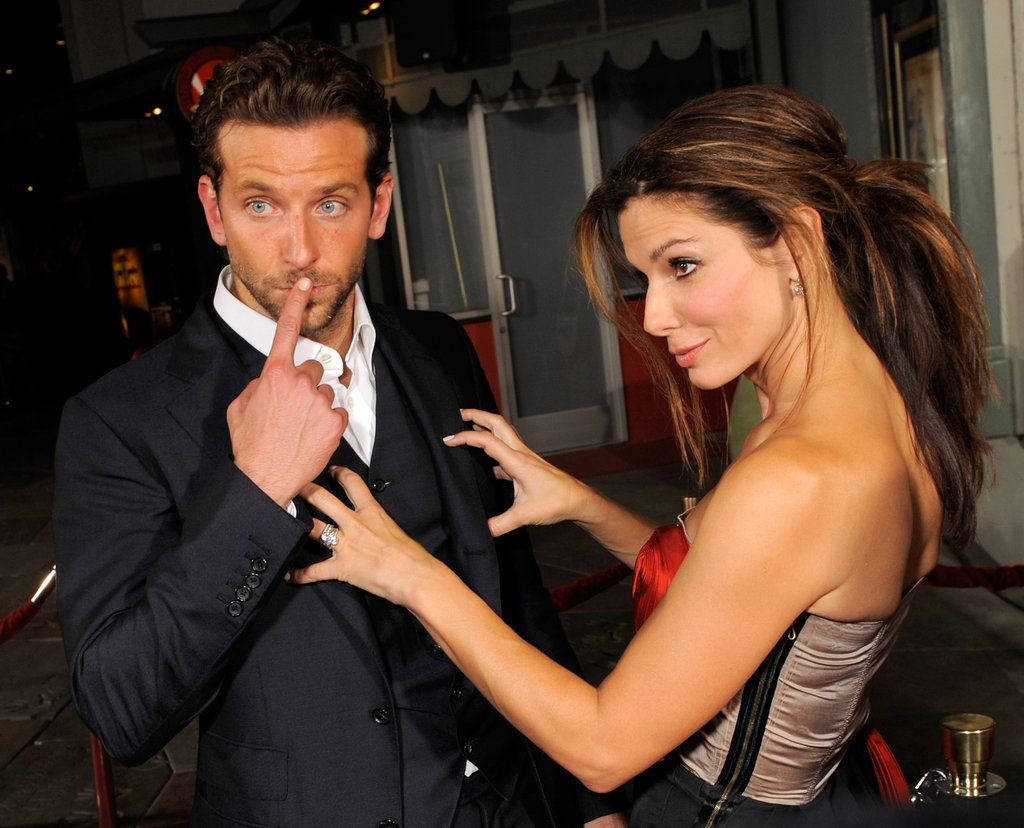 She and Bradley Cooper put on a show for photographers at their August 2009 LA premiere of All About Steve.
She and Bradley Cooper put on a show for photographers at their August 2009 LA premiere of All About Steve.