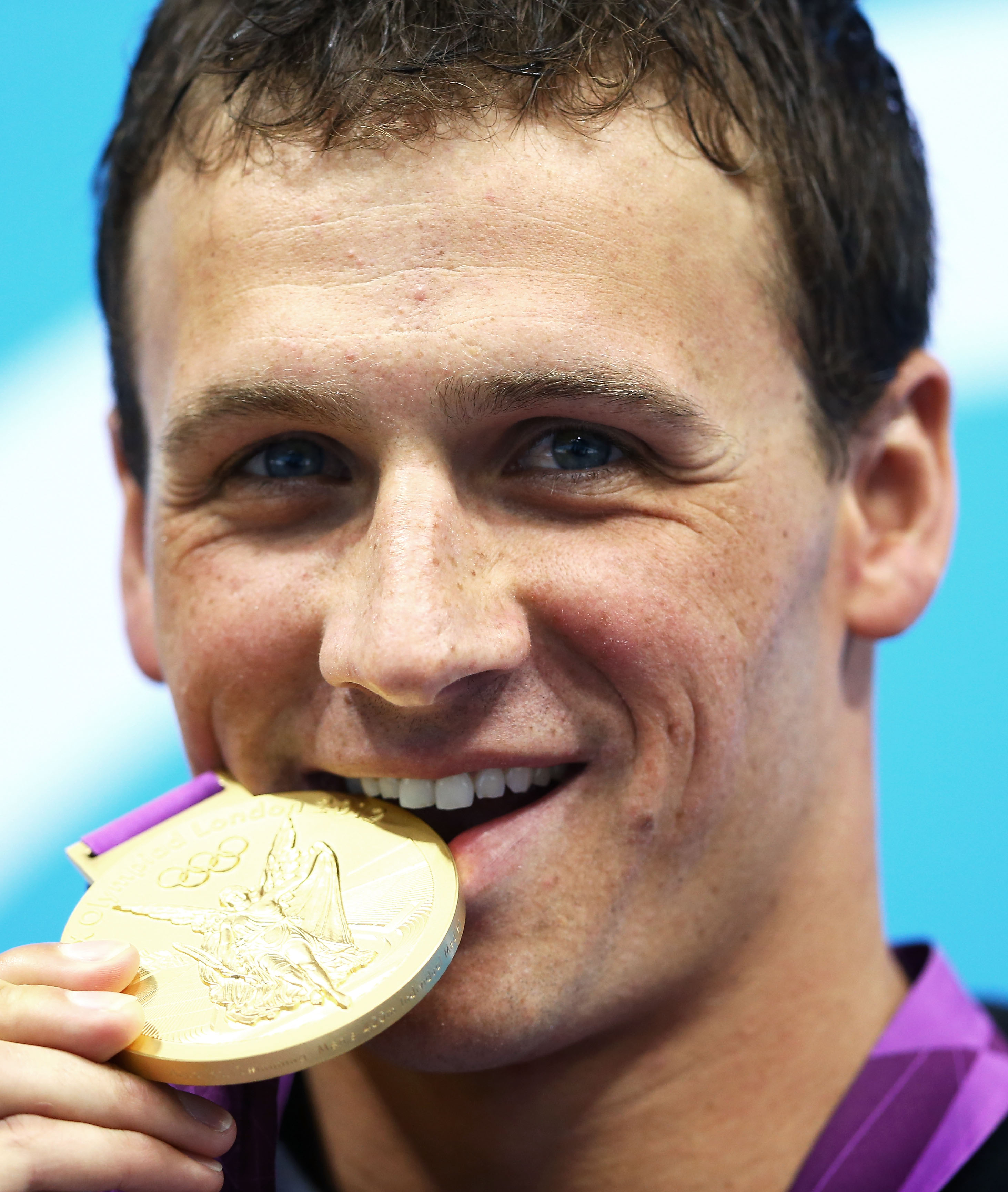 Ryan bit his gold medal during last Summer&#39;s Olympics. - Ryan-bit-his-gold-medal-during-last-Summer-Olympics