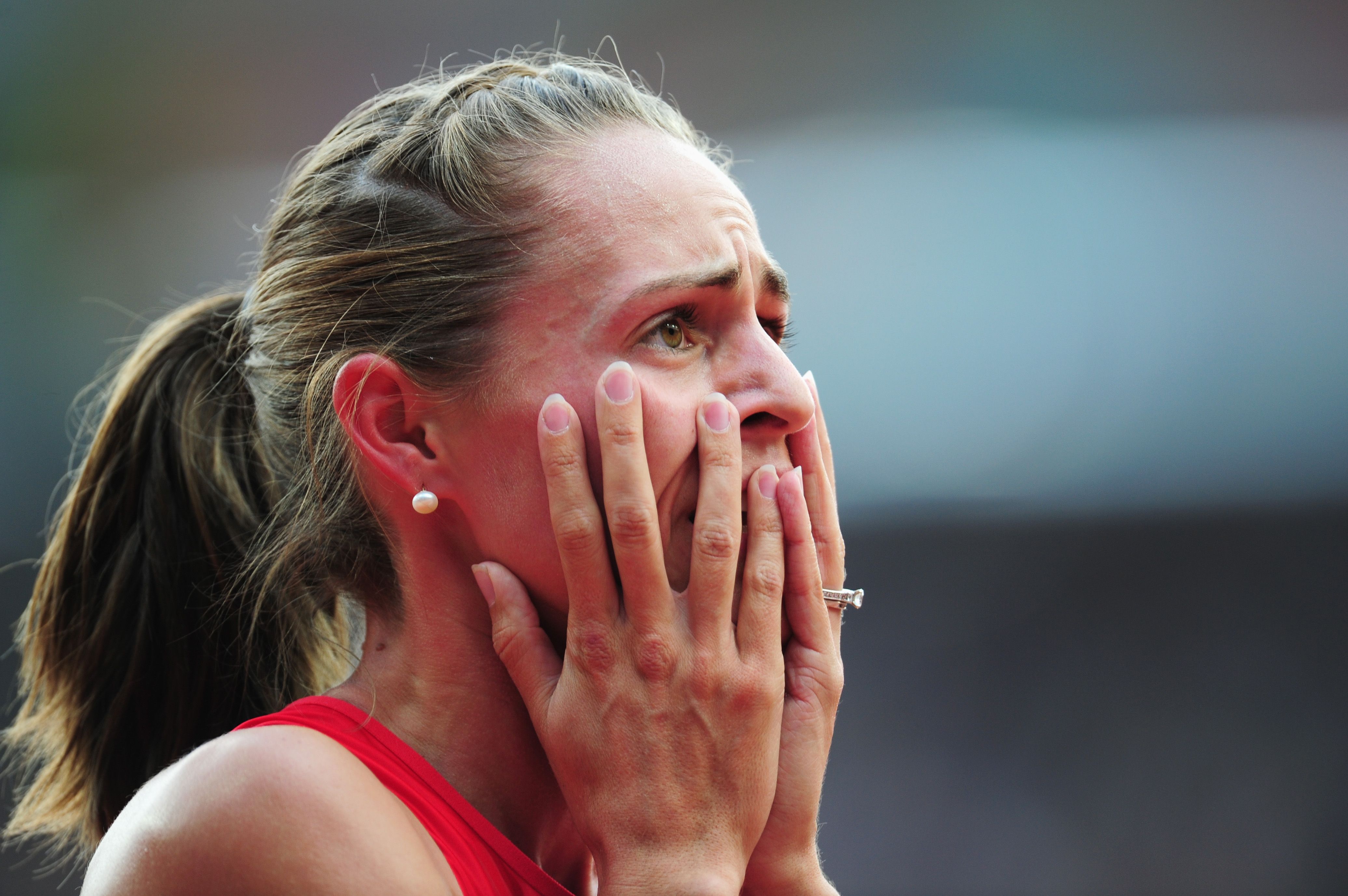 US runner Jennifer Simpson reacted after competing her heat. - US-runner-Jennifer-Simpson-reacted-after-competing-her-heat