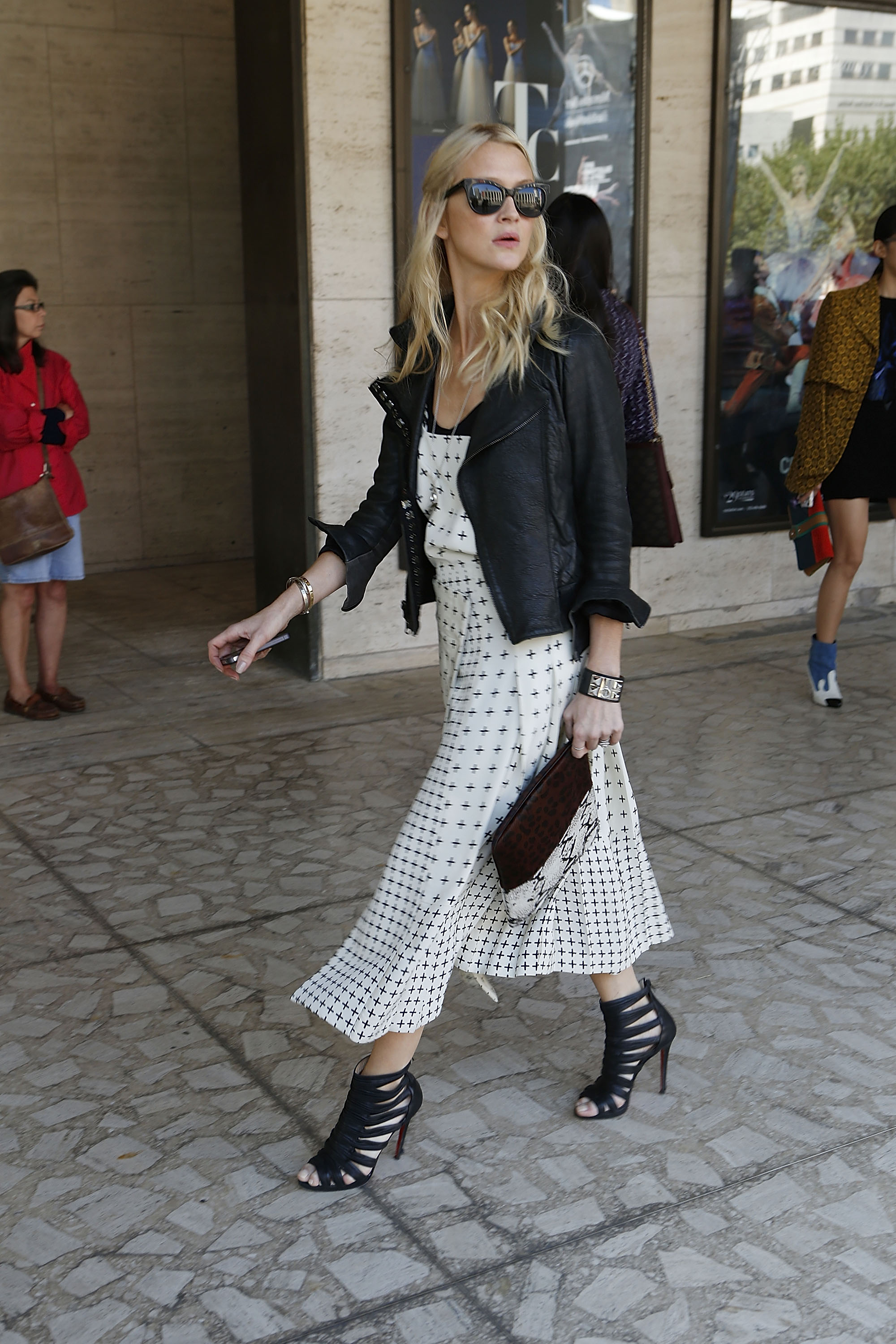 A leather jacket gave a printed midi dress a cool counterpart — as