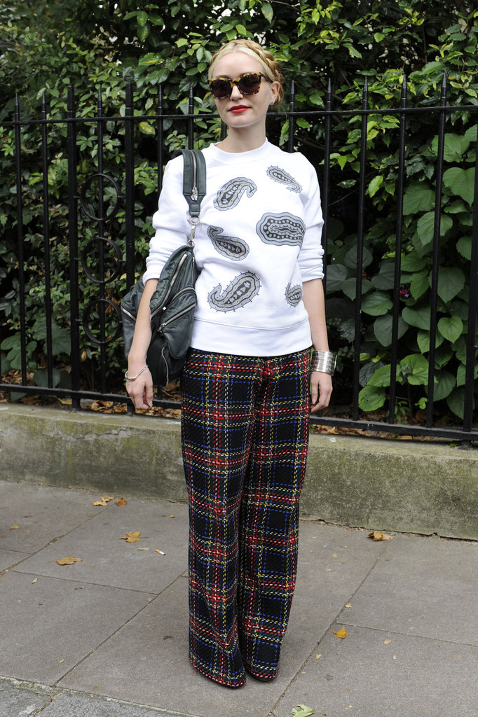 This street-cool mix got its statement power via a paisley print sweatshirt and wide-leg plaid pants.
This street-cool mix got its statement power via a paisley print sweatshirt and wide-leg plaid pants.