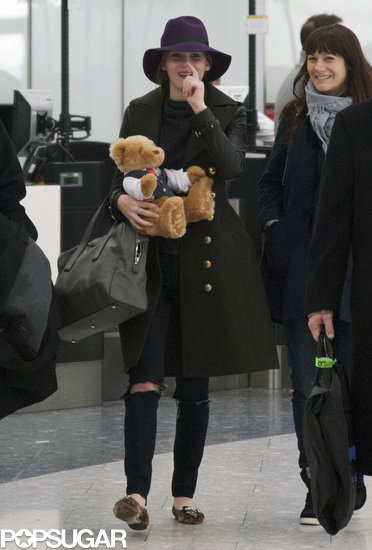 Jennifer Lawrence Gets the Giggles While Flying Home With Her Teddy Jennifer Lawrence Gets the Giggles While Flying Home With Her Teddy