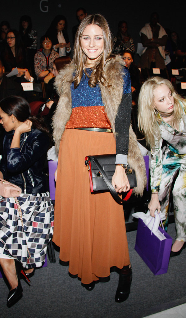 At Noon by Noor in NYC, Olivia topped her orange maxi with a sparkly colorblocked sweater and plush fur vest.
At Noon by Noor in NYC, Olivia topped her orange maxi with a sparkly colorblocked sweater and plush fur vest.