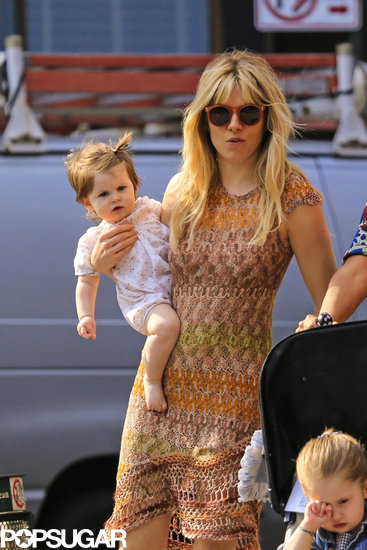 Sienna Miller wore a Missoni dress as she carried Marlowe Sturridge during a playdate in NYC.
Sienna Miller wore a Missoni dress as she carried Marlowe Sturridge during a playdate in NYC.