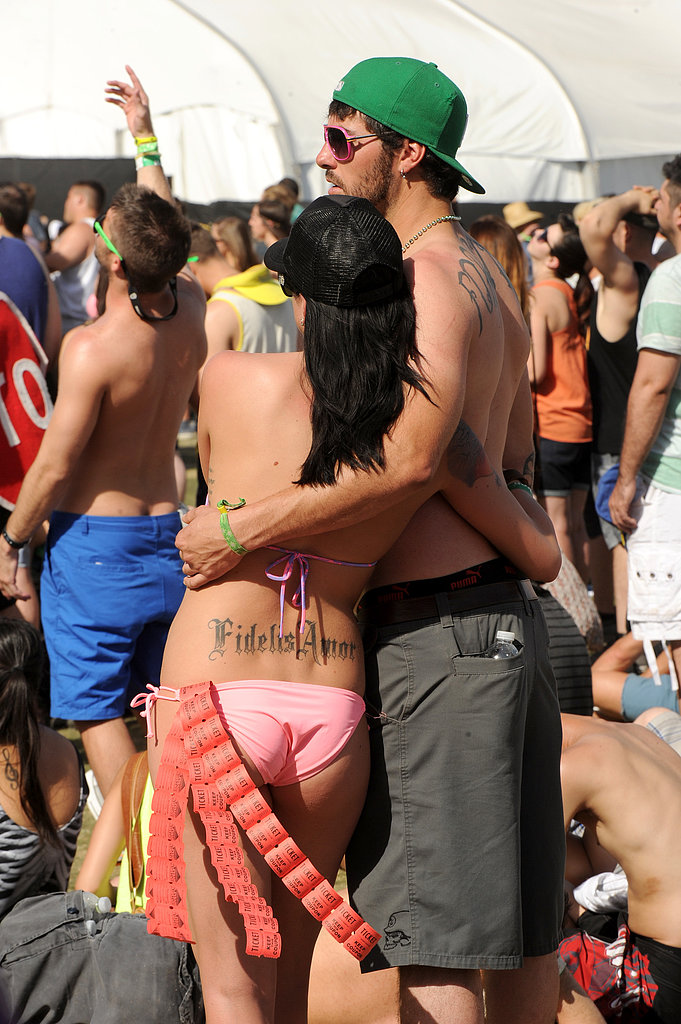 A couple embraced at Coachella.
A couple embraced at Coachella.