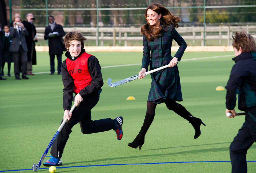 Just before her pregnancy announcement, Kate played field hockey in November 2012 with a group of children at St. Andrew's School in Berkshire, England.
Just before her pregnancy announcement, Kate played field hockey in November 2012 with a group of children at St. Andrew's School in Berkshire, England.