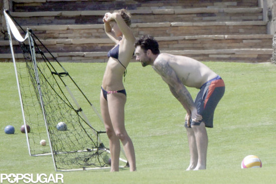Adam Levine and his girlfriend, Nina Agdal, played volleyball with friends. Adam Levine and his girlfriend, Nina Agdal, played volleyball with friends.