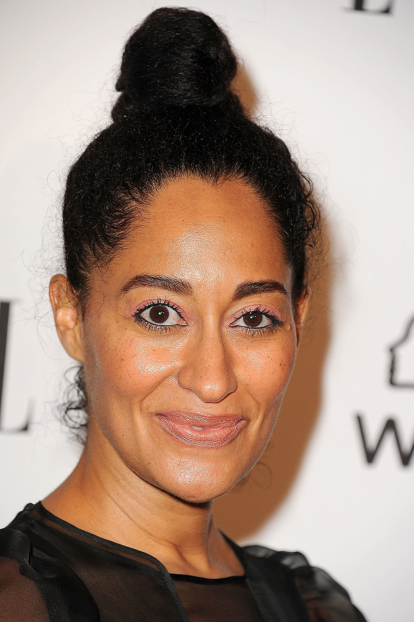 Actress Tracee Ellis Ross pulled her thick curls into a high bun, which is the - Actress-Tracee-Ellis-Ross-pulled-her-thick-curls-high-bun