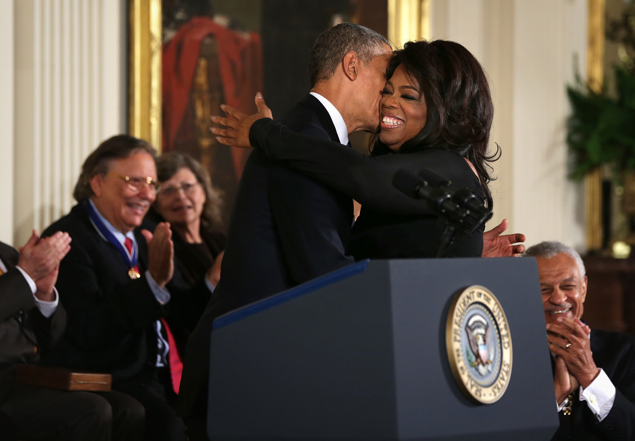 Oprah-Winfrey-all-smiles-while-accepting-her-award-from-President.jpg