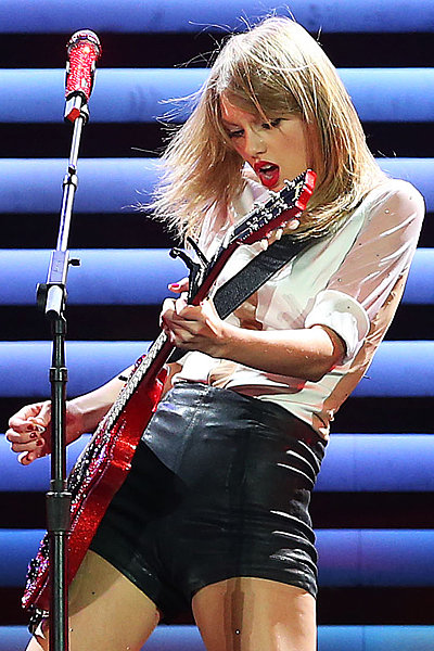Stringing Her Guitar Stringing Her Guitar