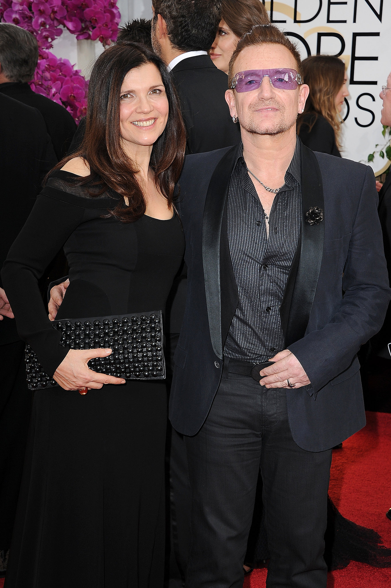 Bono and his wife, Alison, posed for pictures on the red carpet. It's