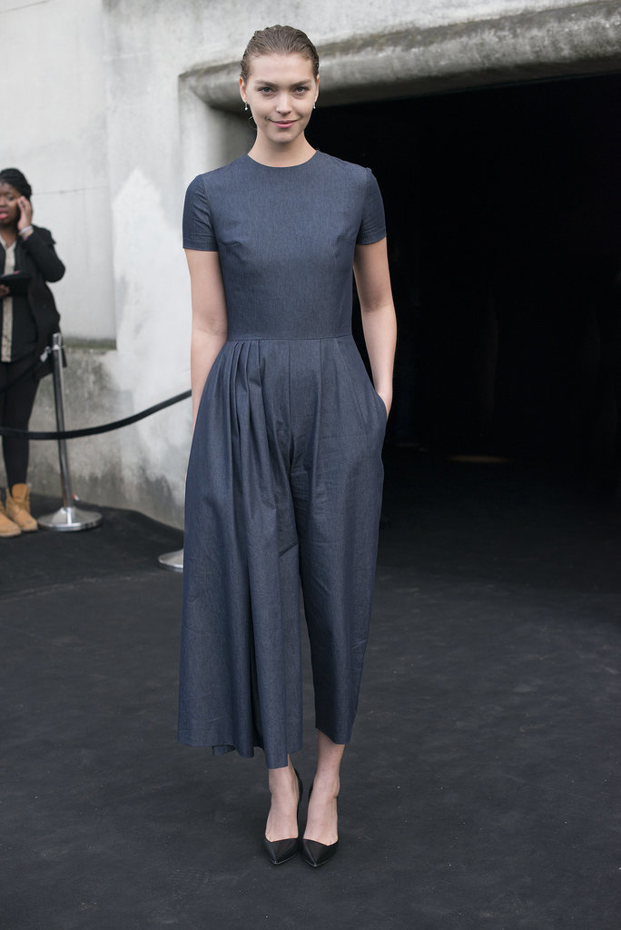 Arizona Muse made us want to borrow the less-is-more approach in her simplified day dress and heels.
Arizona Muse made us want to borrow the less-is-more approach in her simplified day dress and heels.