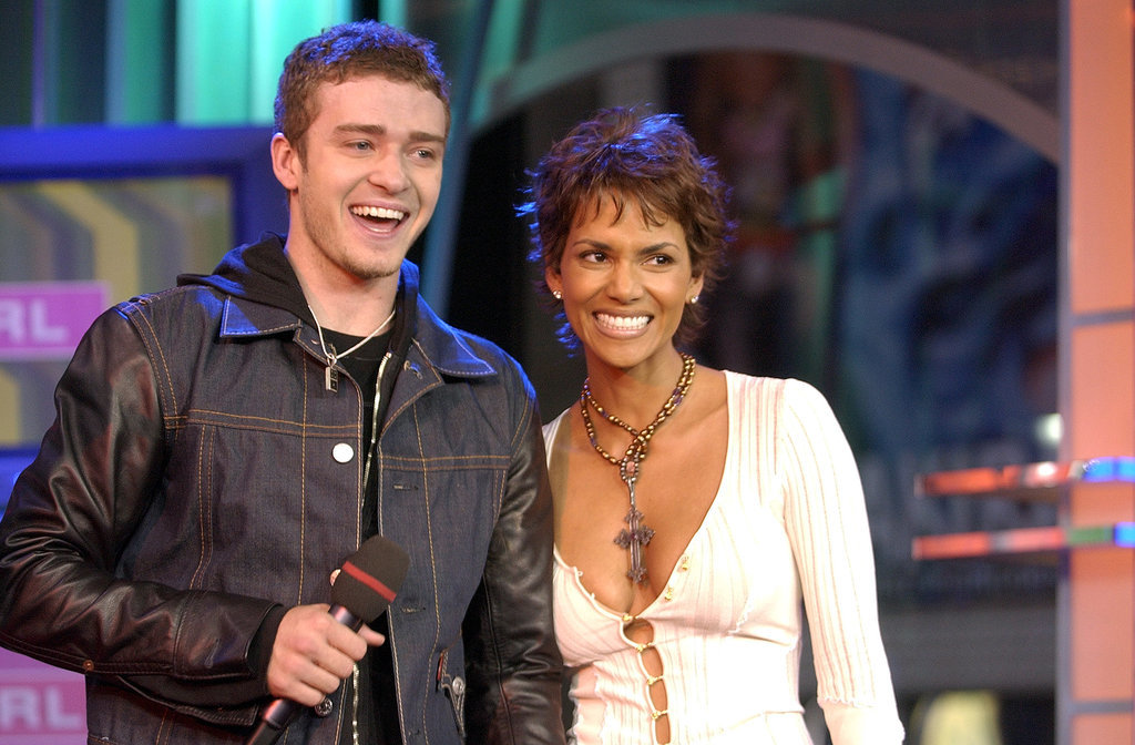 Justin he was a lucky man standing next to Halle Berry during his November 2002 TRL performance.
Justin he was a lucky man standing next to Halle Berry during his November 2002 TRL performance.