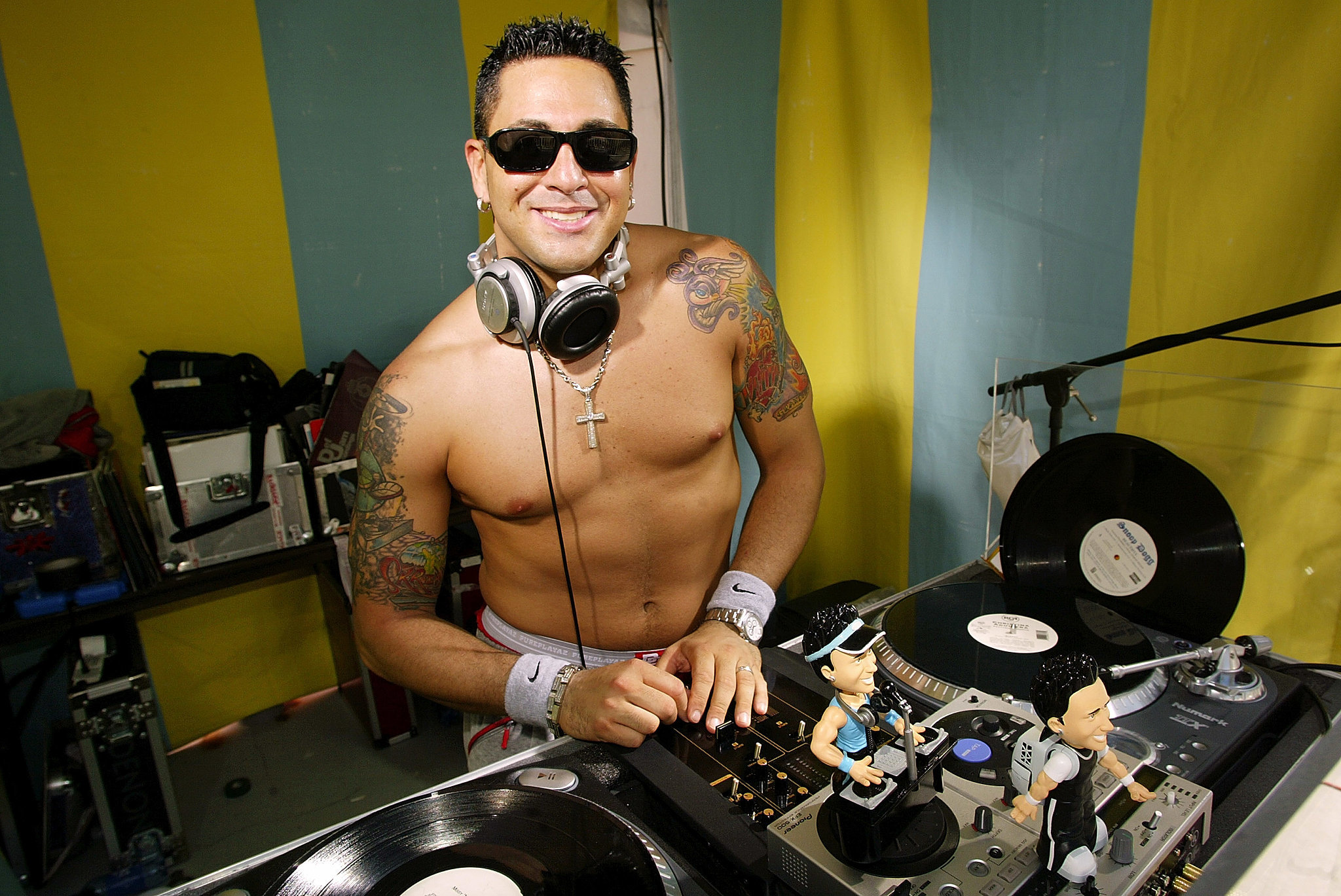 2003: Shirtless DJ Skribble spins on the ones and twos in Miami Beach ...