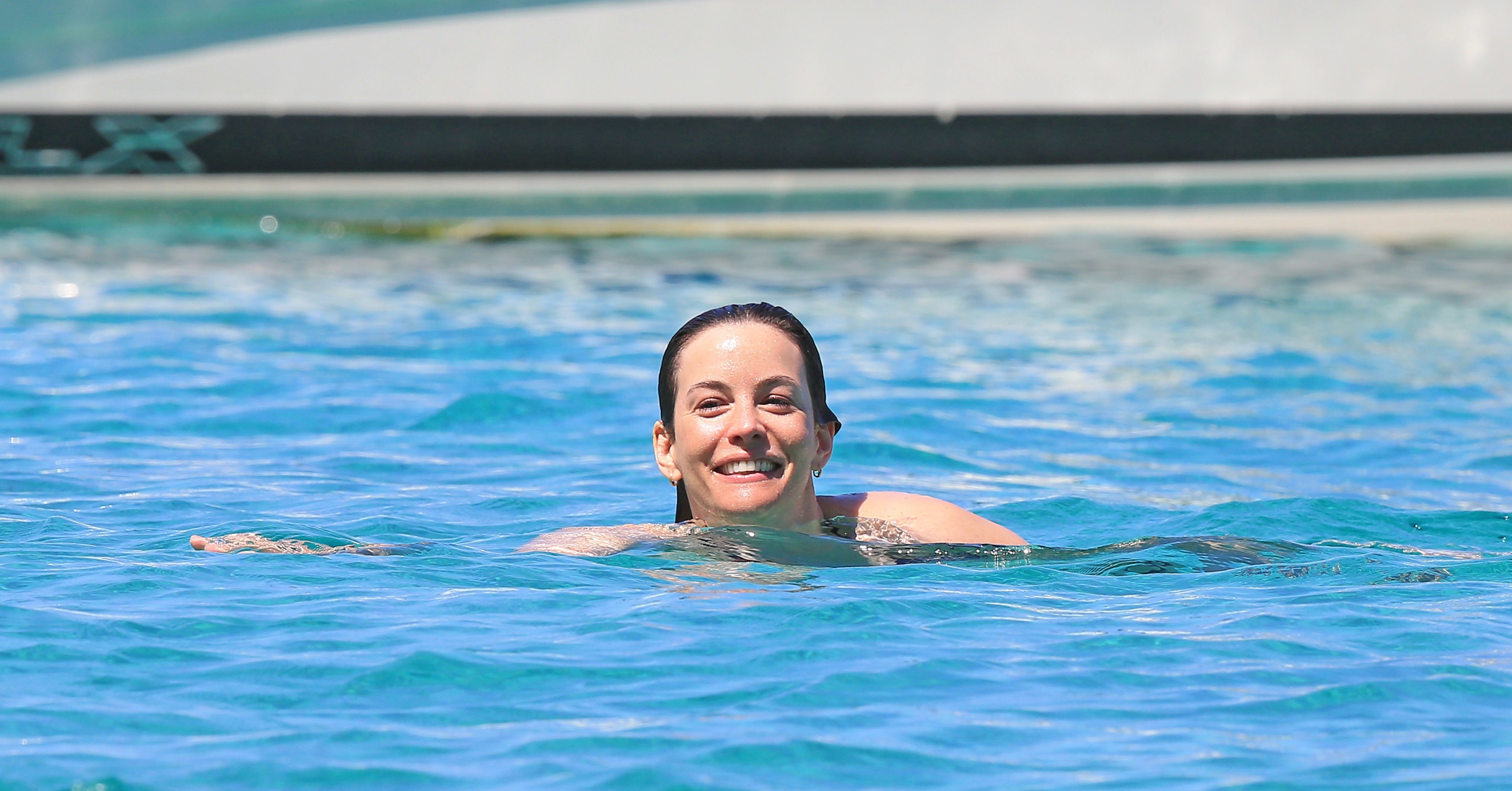 Liv Tyler took a dip in the water while vacationing in Spain on Can't
