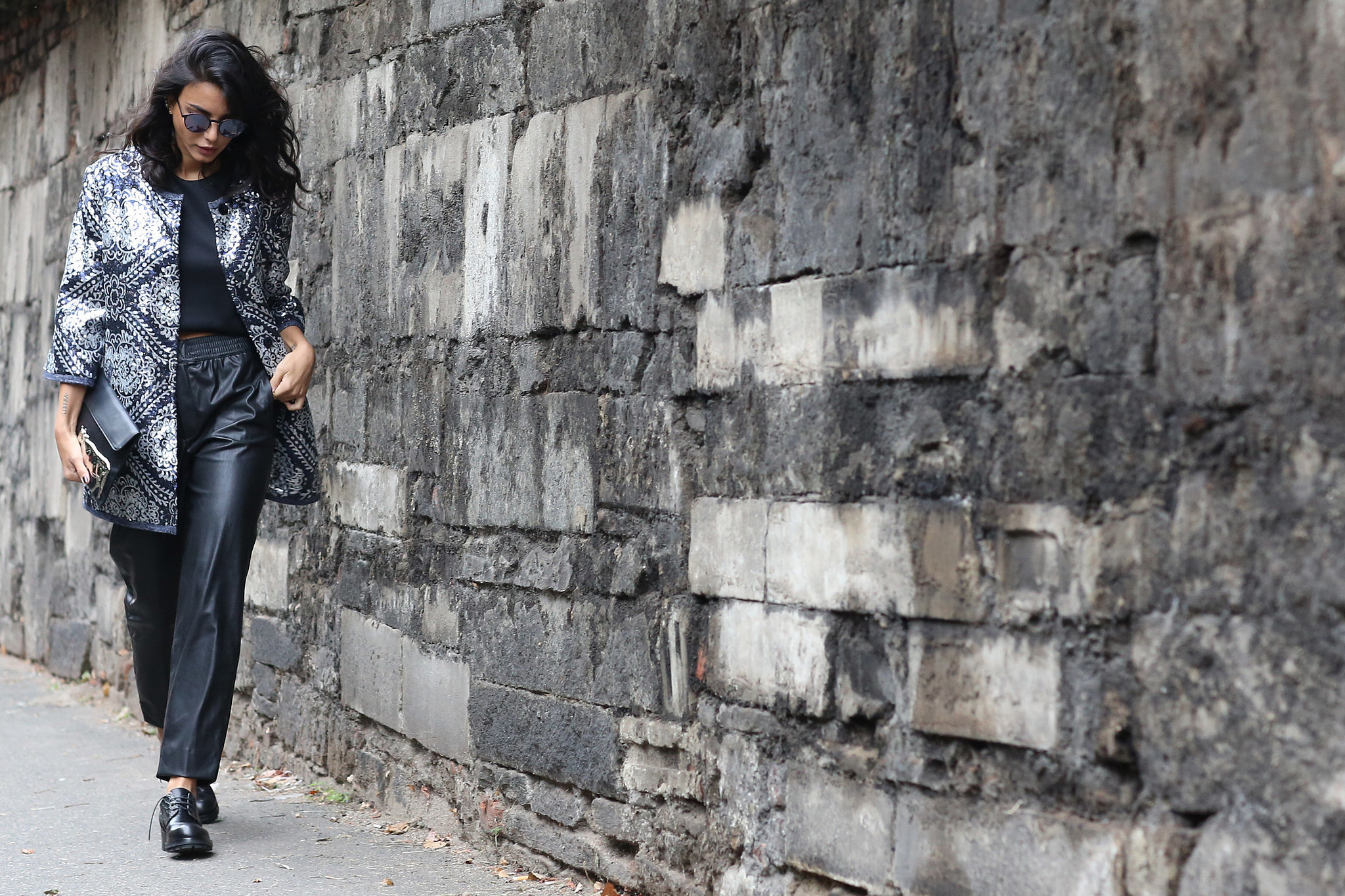 Loosen up a structured coat with laidback leather on bottom. How to