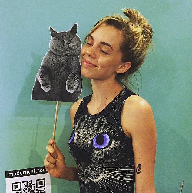 If you don't dress like a cat and pose with cats, what are you even
