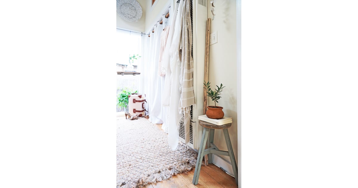 Hanging tapestries and plants go a long way to conceal and enhance