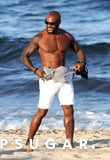 Tyson Beckford Ditches Shirt Flexes