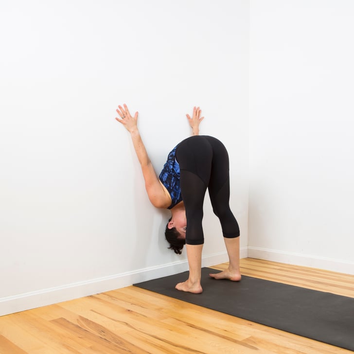 Standing Forward Bend Relaxing Wall Yoga Sequence Popsugar Fitness