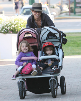 boy and girl double pushchair