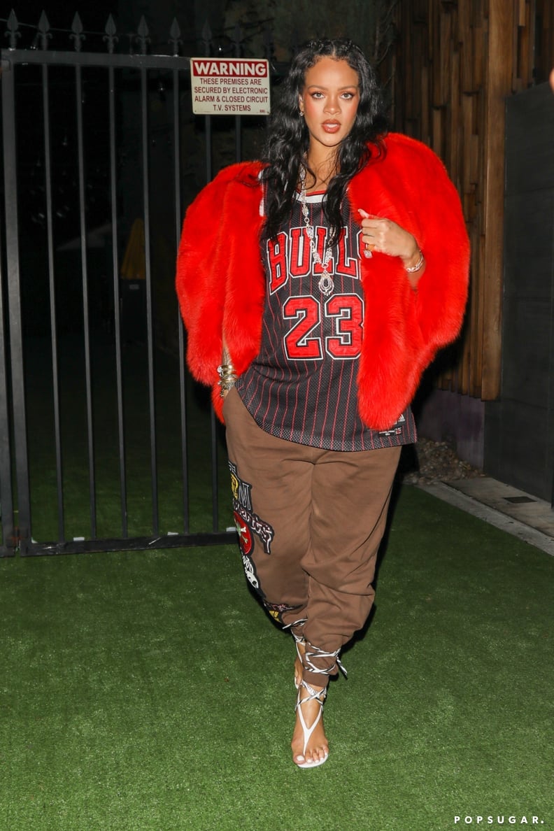 Rihanna Wearing a Bulls Jersey and a Saint Laurent Heart Coat