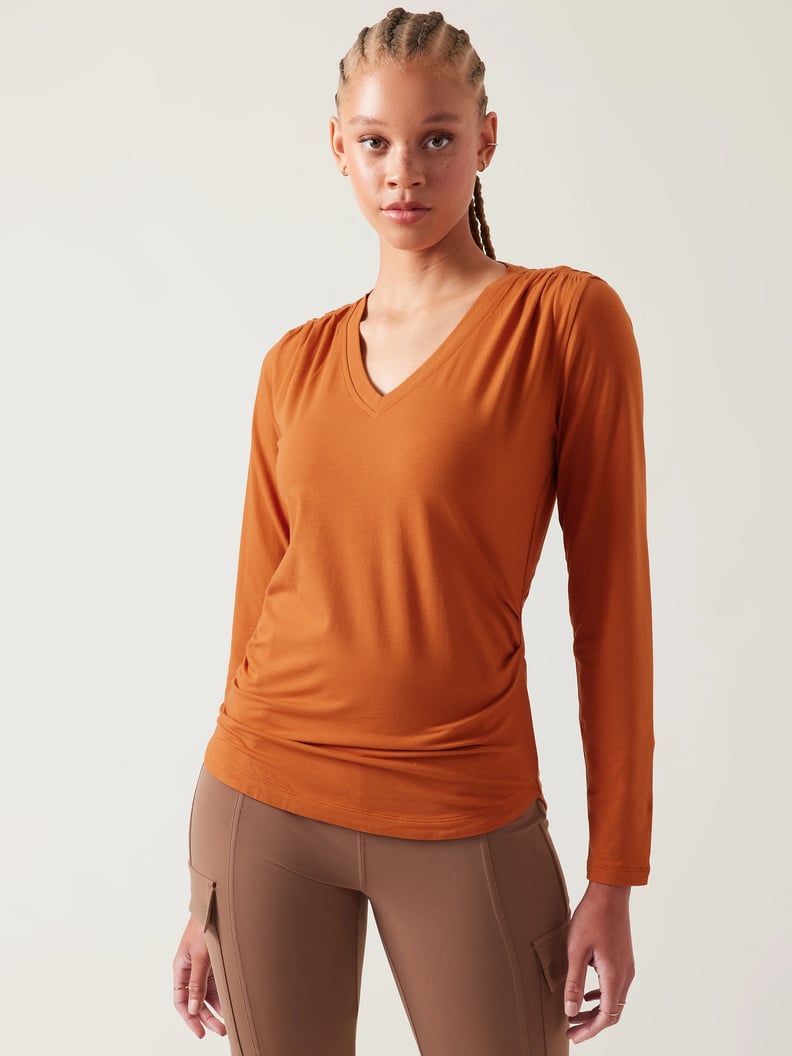 Womens clothing sizing- same fabric type, orange is an Athleta
