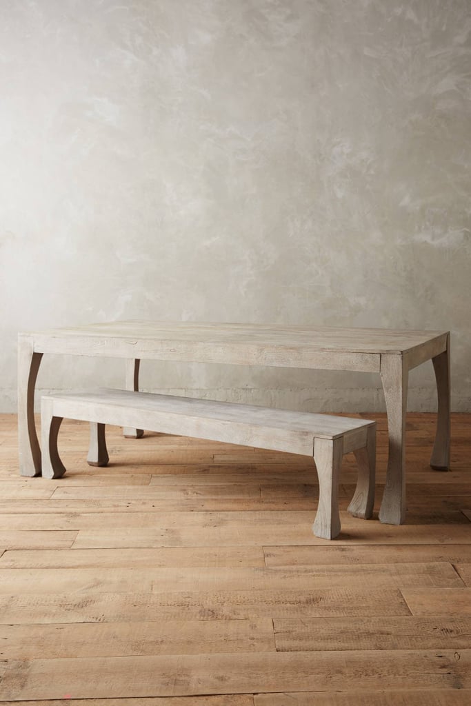 Mango wood table with curved legs (from $998)