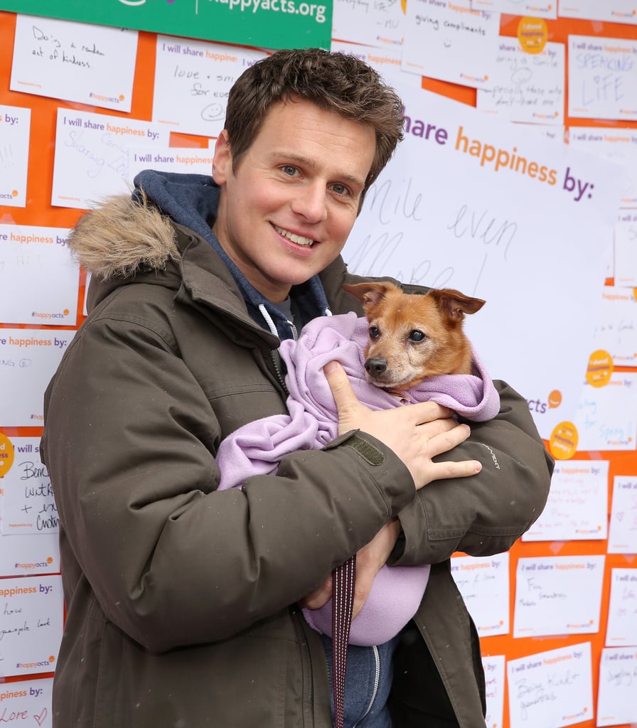 Jonathan Groff held a bundled-up dog at an NYC animal shelter in March 2015.