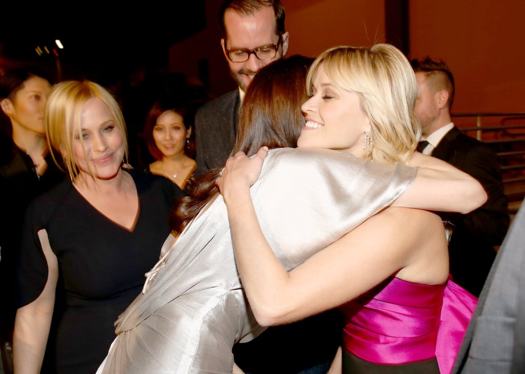 Reese Witherspoon got a giant hug from Angelina Jolie while Patricia Arquette looked on.