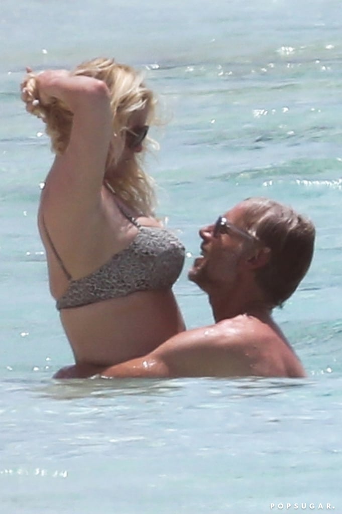 Jessica Simpson and husband Eric Johnson brought their love to the beach in the Bahamas on Friday. The couple, who have been together since 2010 and have two kids together, flaunted their figures and their hot chemistry while taking a dip in the ocean and relaxing on beach chairs. That same day, Jessica shared a saucy Instagram snap of herself in a printed Malia Mills bikini, writing, "Vacation closet vibes." A day earlier, she posted a photo of Eric on his way to catch a wave.
It's been quite a while since we've seen Jessica rocking a two-piece, and she looks amazing. The footwear mogul is mom to daughter Maxwell, who turns 6 on May 1, and 4-year-old son Ace. And while it isn't clear if her getaway is a family trip or adults-only vacation, Jessica definitely seems to be enjoying her time in the sun. Keep reading to see her and Eric hanging in the Bahamas.

    Related:

            
            
                                    
                            

            Jessica Simpson Can Still Rock a Pair of Daisy Dukes Like It&apos;s the Late &apos;90s