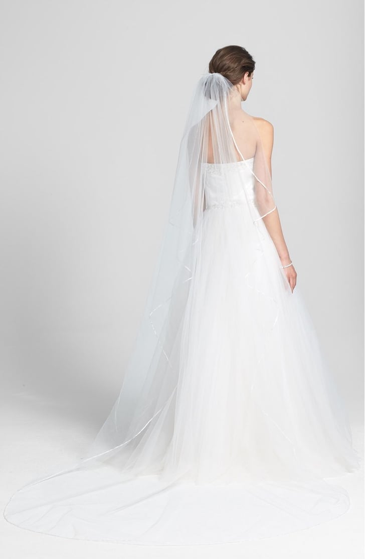 Measuring 108 inches in length, this cathedral veil (185) features a