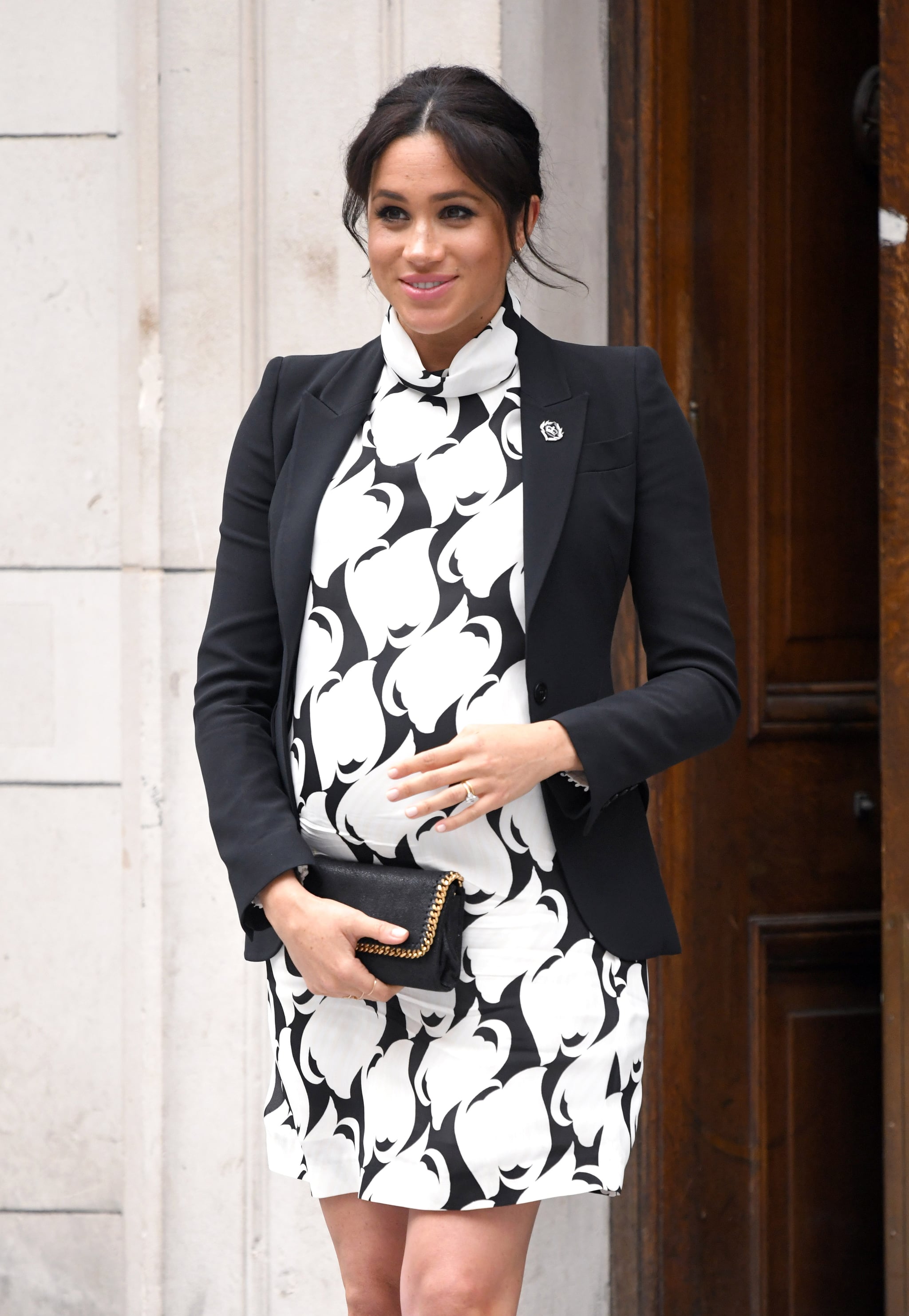 LONDON, ENGLAND - MARCH 08: Meghan, Duchess of Sussex departs after joining a panel discussion convened by The Queen's Commonwealth Trust to mark International Women's Day at King's College London on March 08, 2019 in London, England. (Photo by Karwai Tang/WireImage)