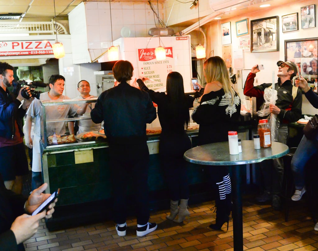 Kim and Khloe Kardashian Eating Pizza in NYC May 2017