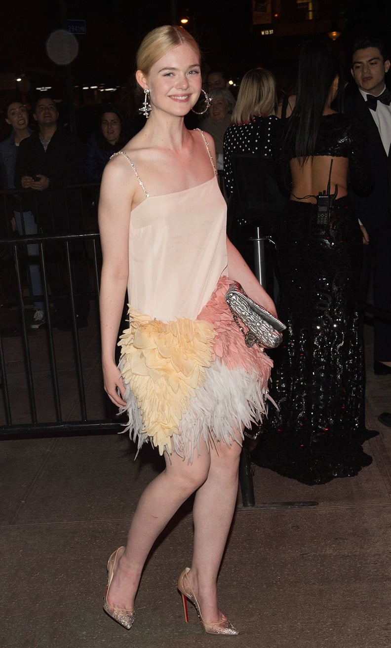 Elle Fanning Took a Miu Miu Feathered Slip For a Spin at the 2017 Met Gala Afterparty
