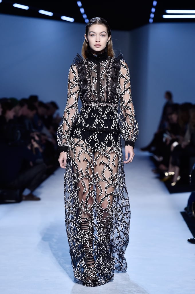 Gigi led the finale at Giambattista Valli in this sheer maxi with embroidered vines and chiffon ruffle details. She kept on her strappy shoes.