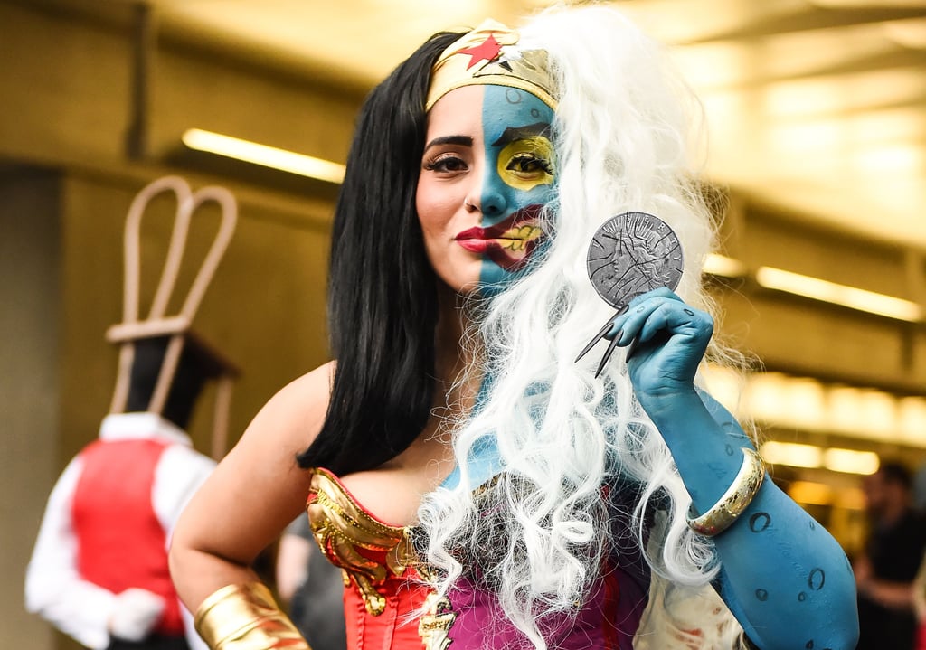 How incredible is this two-faced Wonder Woman costume? To complement her creepier half, the wearer is rocking long fake nails, contact lenses, and a wild white wig on her left side.
