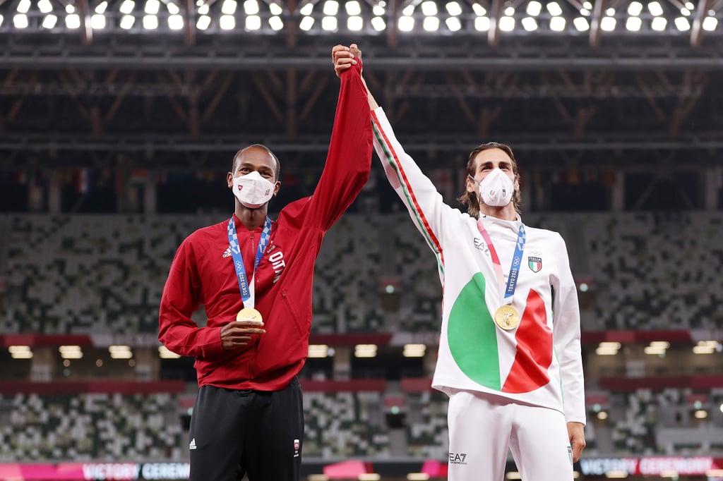 Olympic High Jumpers Share the Gold Medal | Photos