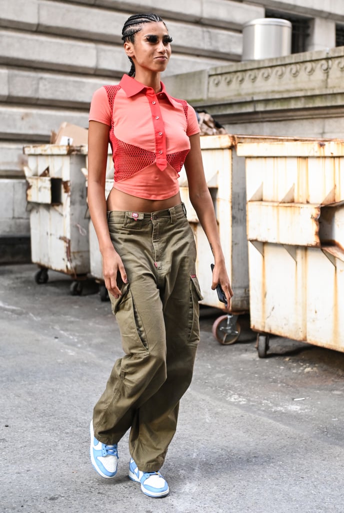 Polish off cargos with a statement blouse in a standout color. How to