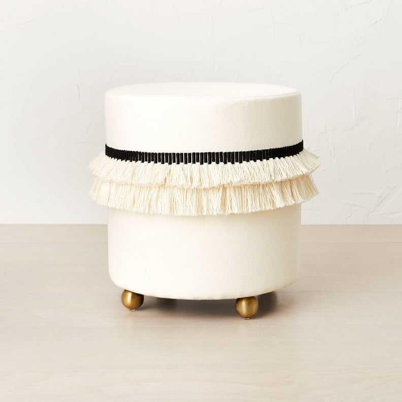 A Glam Ottoman: Opalhouse designed with Jungalow Catania Tassel Ottoman with Ball Feet