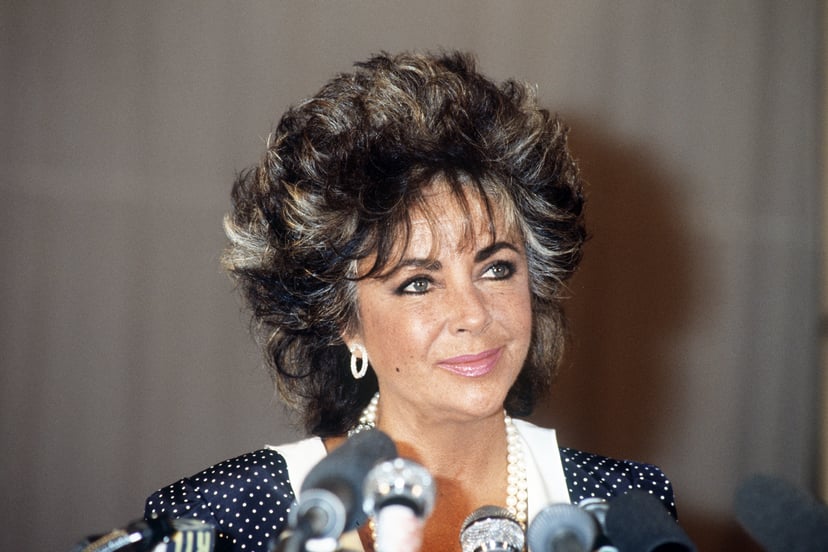 US actress Elizabeth Taylor attends a gala at the Paradis Latin organised for the fight against AIDS, on November 11, 1985, in Paris. (Photo credit should read PIERRE GUILLAUD/AFP/Getty Images)