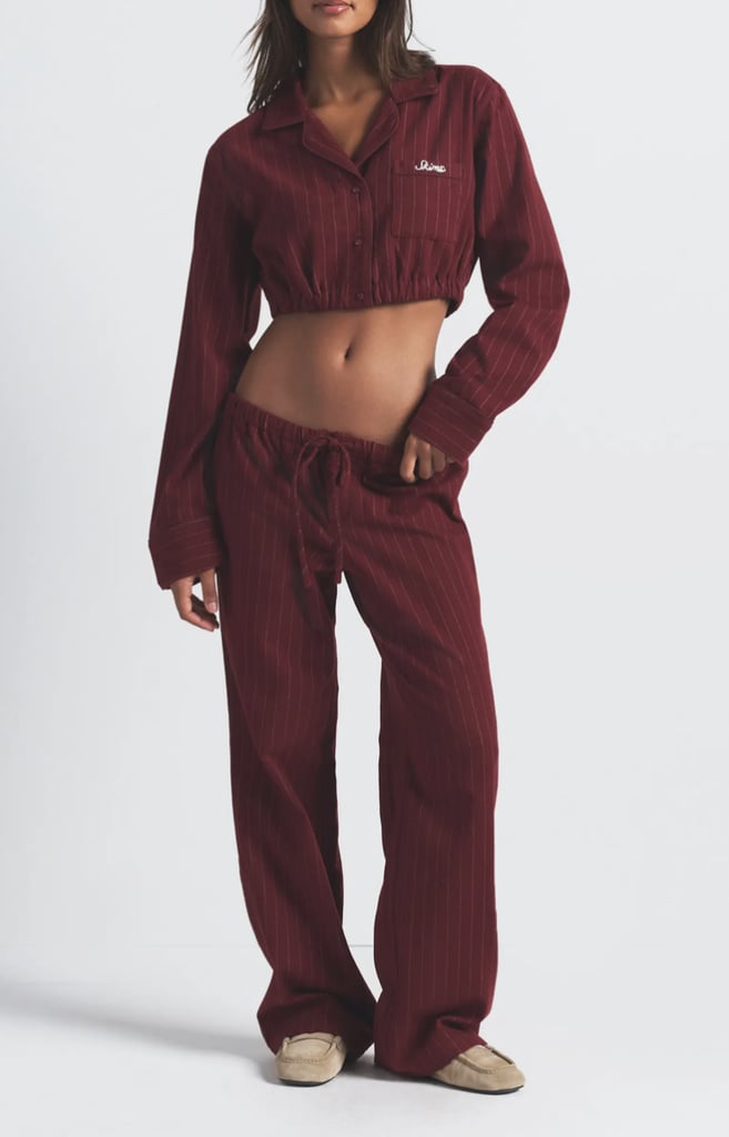 Skims Elevated Flannel Crop Pajamas ($63, originally $158)
These flannel pajamas have a super-soft feel that you'll never get tired of. Whether you're someone who's looking to mix up their work-from-home wardrobe or simply lounging, this pinstripe set is the perfect gift.